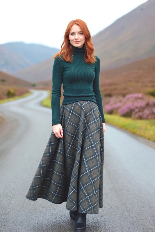 woman in green sweater and grey wool plaid maxi skirt